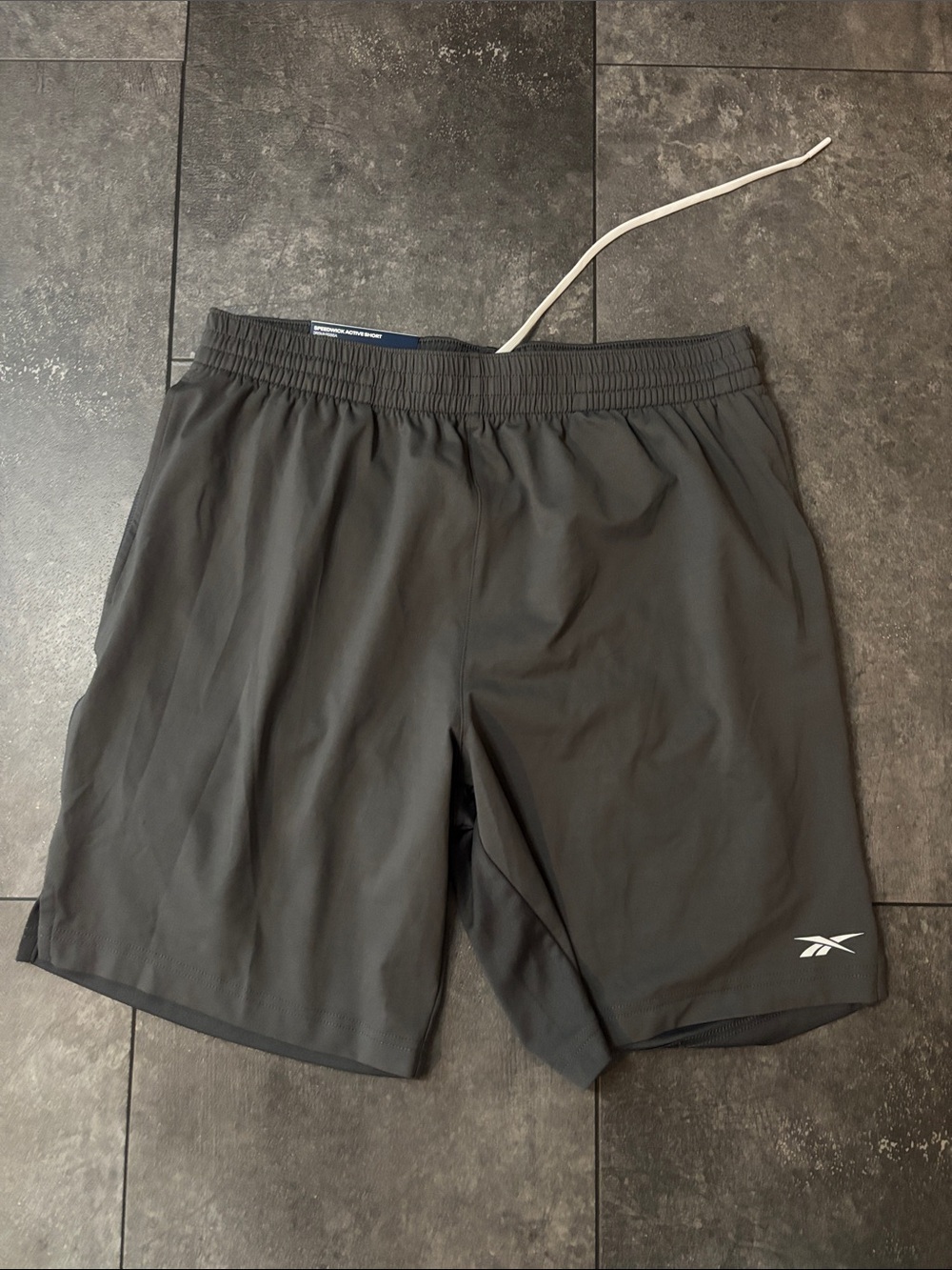 Reebok Men’s Charcoal Athletic Shorts with White Logo